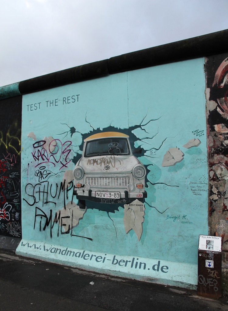 East Side Gallery (Berlin Wall): "Test the Rest" by Kinder.