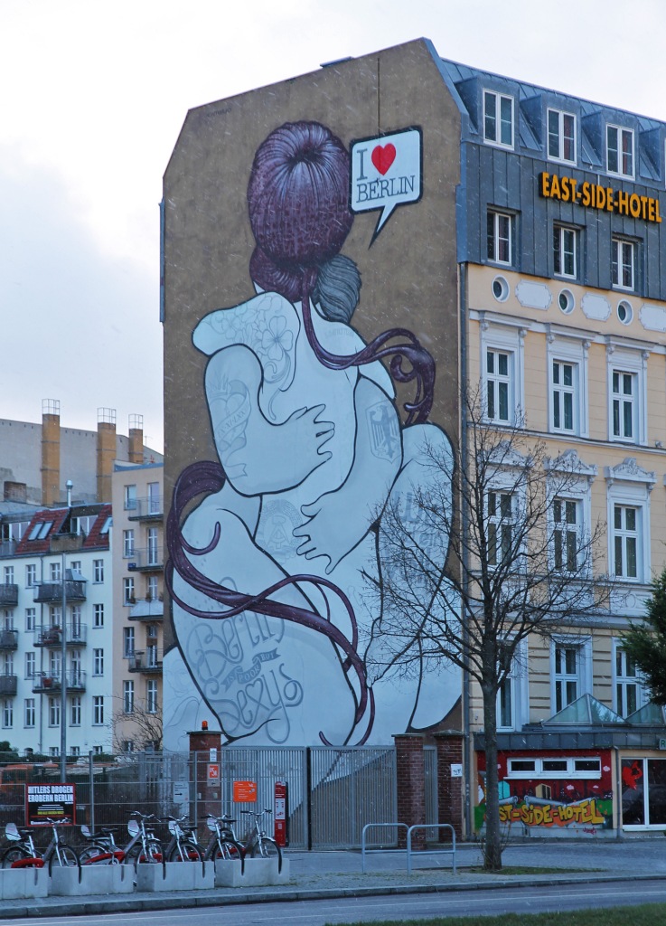 Mural next to the East Side Gallery: I love Berlin. Wir sind ein Volk.